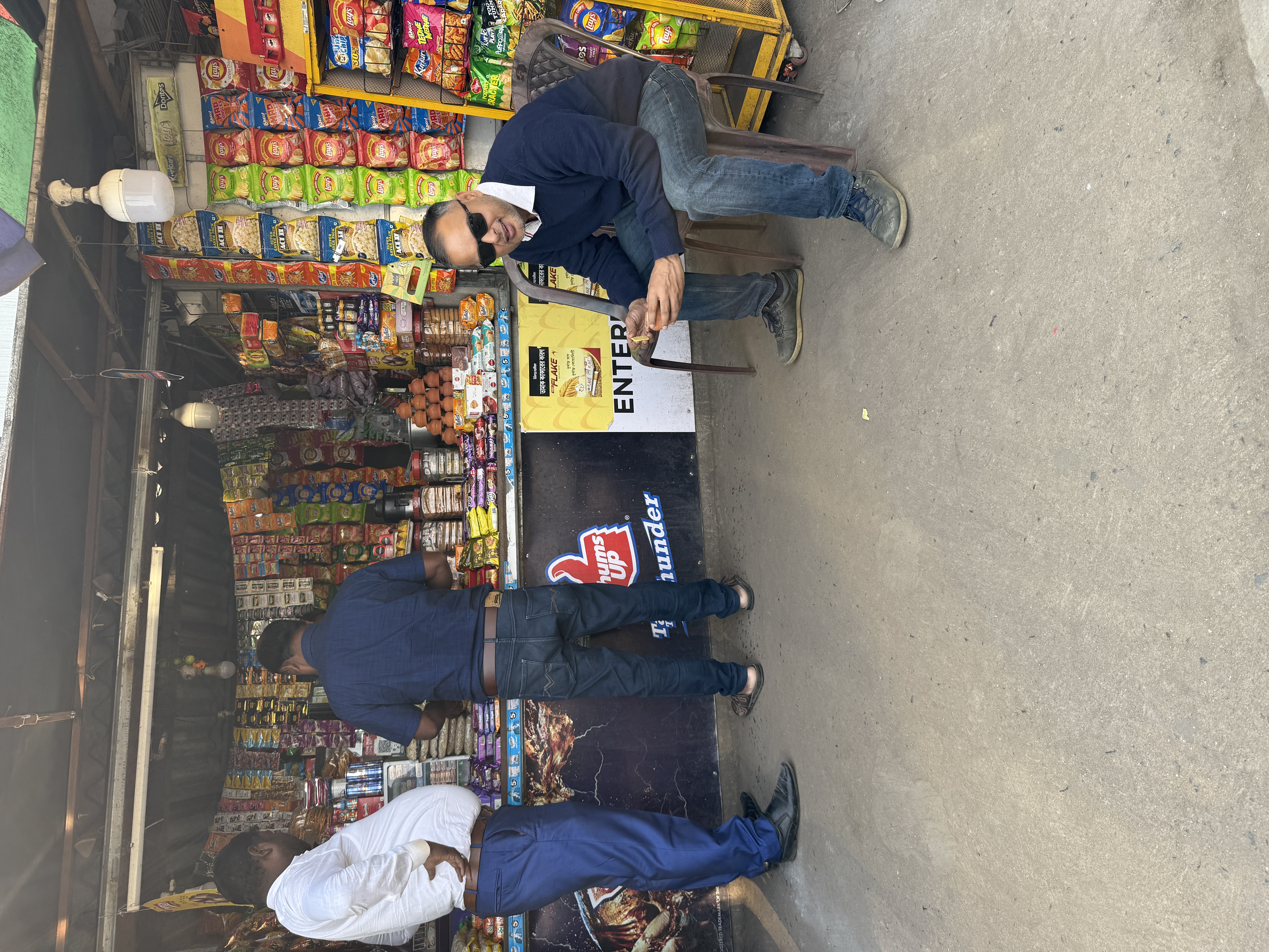 Field visit to a retail outlet during a trade marketing execution programme — observing in-store placement, competitor activity and outlet keeper behaviour