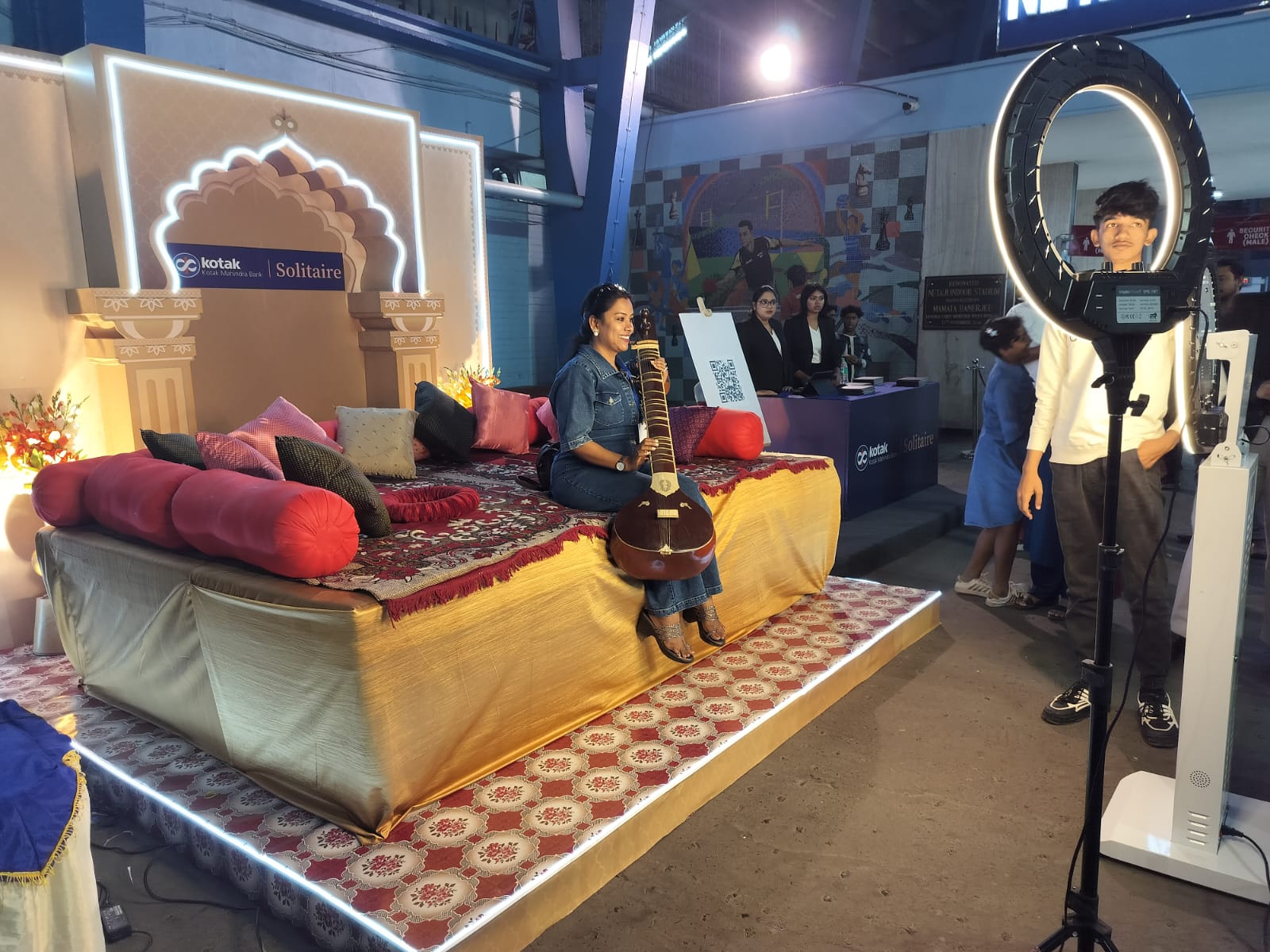 Kotak Solitaire brand experience zone with classical performer