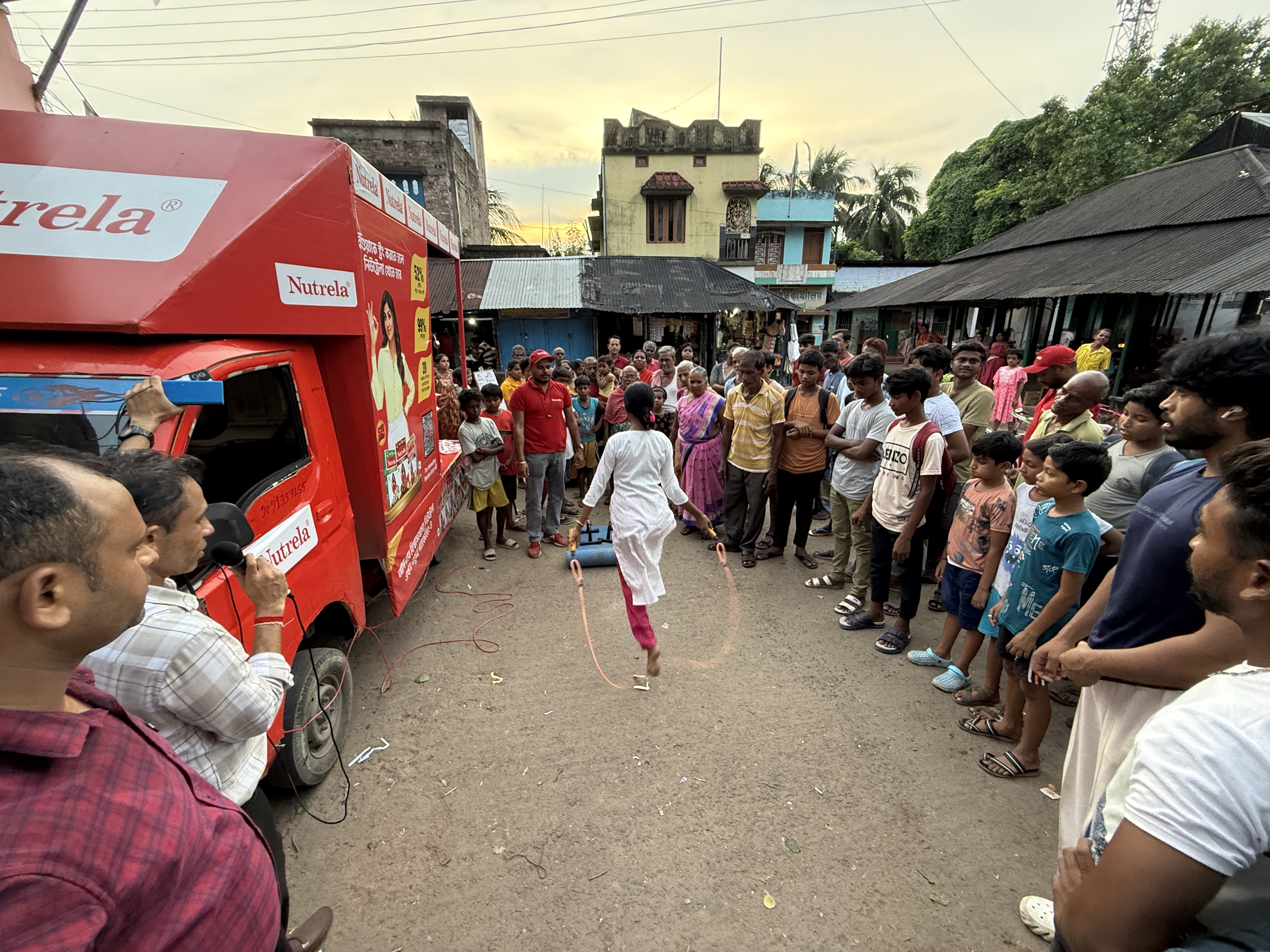 Project TRIDENT — van activation in rural market, West Bengal